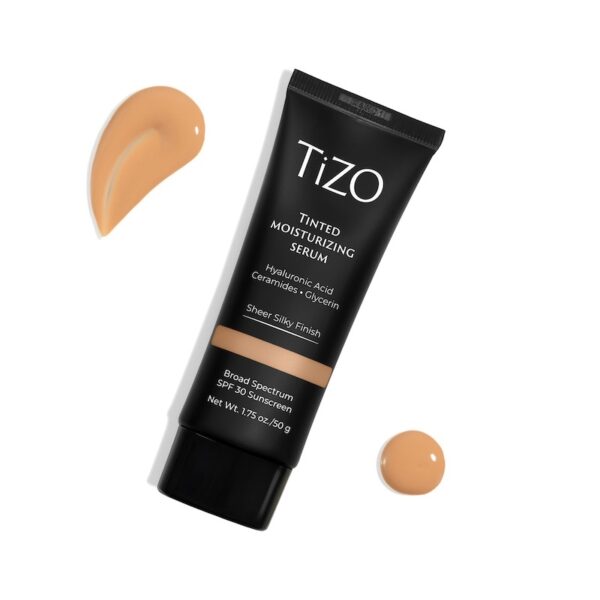 product in a luxe black bottle with product smeared to show consistency and color